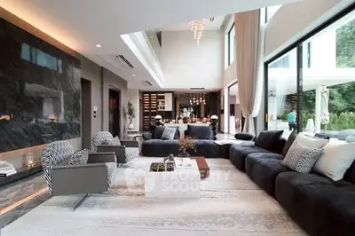 Luxurious modern living room with expansive windows and elegant decor