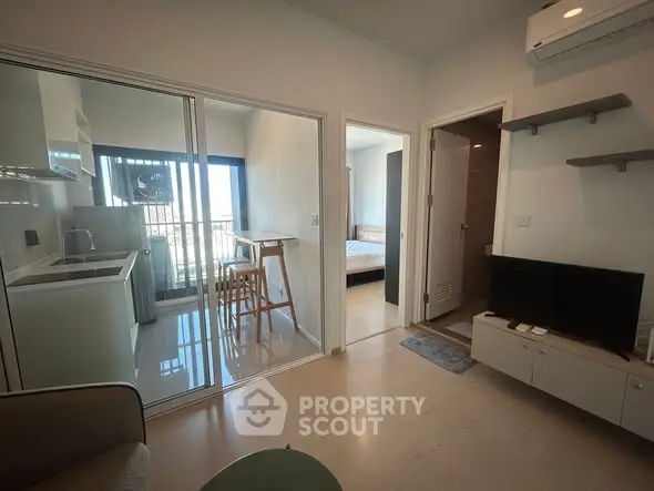 Modern apartment with open kitchen and cozy living area