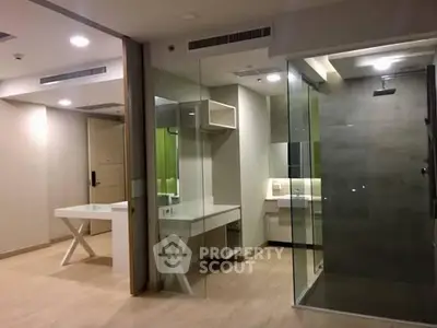 Modern interior with glass shower and sleek design, perfect for contemporary living.