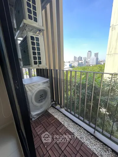 Modern balcony with city view and air conditioning units
