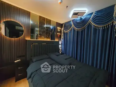 Luxurious bedroom with elegant drapes and modern lighting