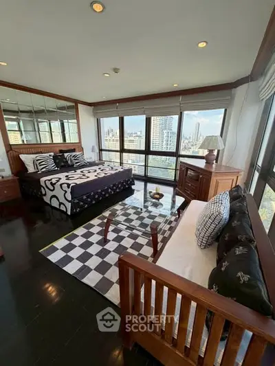 Luxurious bedroom with panoramic city views and elegant decor