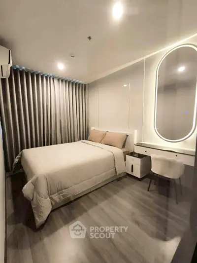 Modern bedroom with sleek design, featuring a cozy bed, elegant lighting, and stylish decor for ultimate comfort.