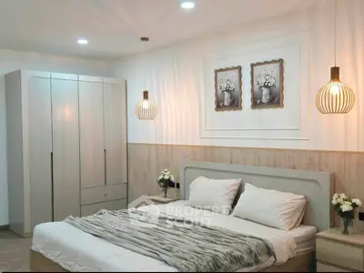 Elegant bedroom with modern decor, cozy lighting, and stylish furniture, perfect for relaxation and comfort.