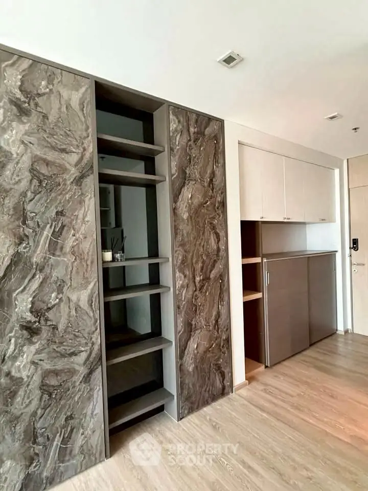 Modern interior with stylish storage and elegant wood flooring