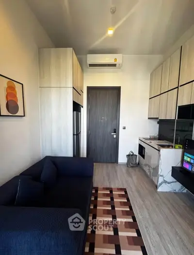 Modern apartment interior with stylish kitchen and cozy living area