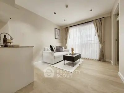 Modern living room with elegant decor and natural light