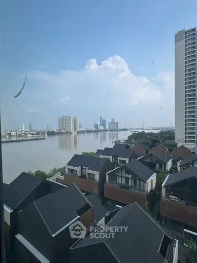 Stunning river view from high-rise building, perfect for urban living enthusiasts.