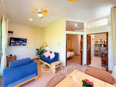 Bright and spacious living room with modern decor and open layout, perfect for relaxation and entertainment.