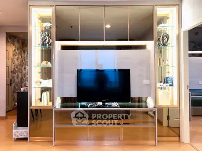 Modern living room with elegant TV stand and decorative shelving