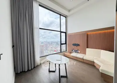 Modern living room with panoramic city view and stylish furniture