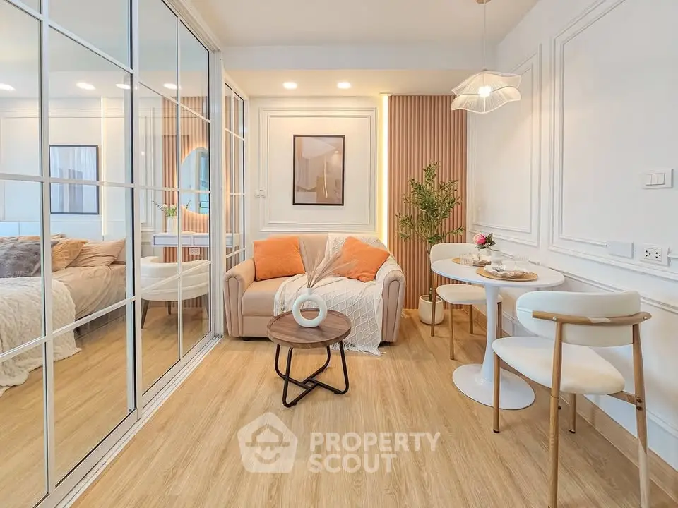 Chic modern living room with cozy seating and elegant dining area, perfect for urban living.