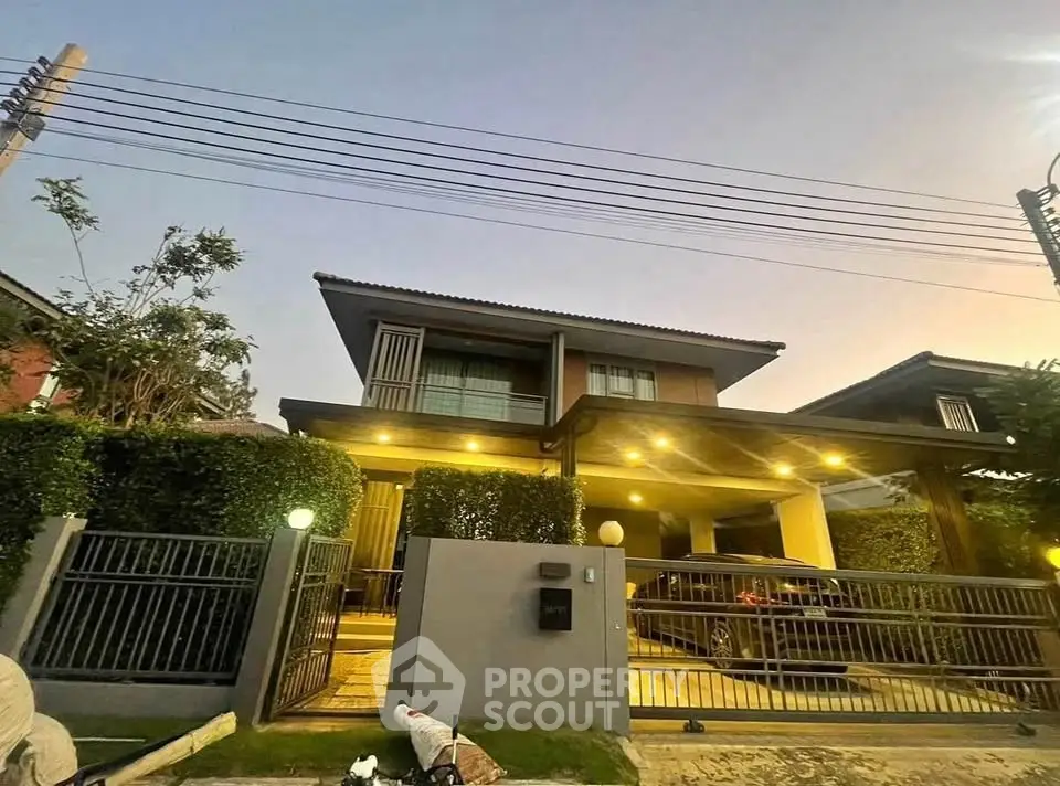 Stunning modern two-story house with spacious driveway and lush greenery, perfect for family living.