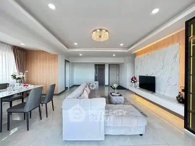 Luxurious modern living room with elegant decor and spacious dining area