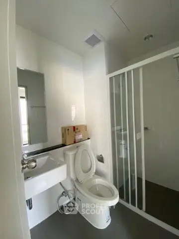 Modern bathroom with sleek design and glass shower enclosure