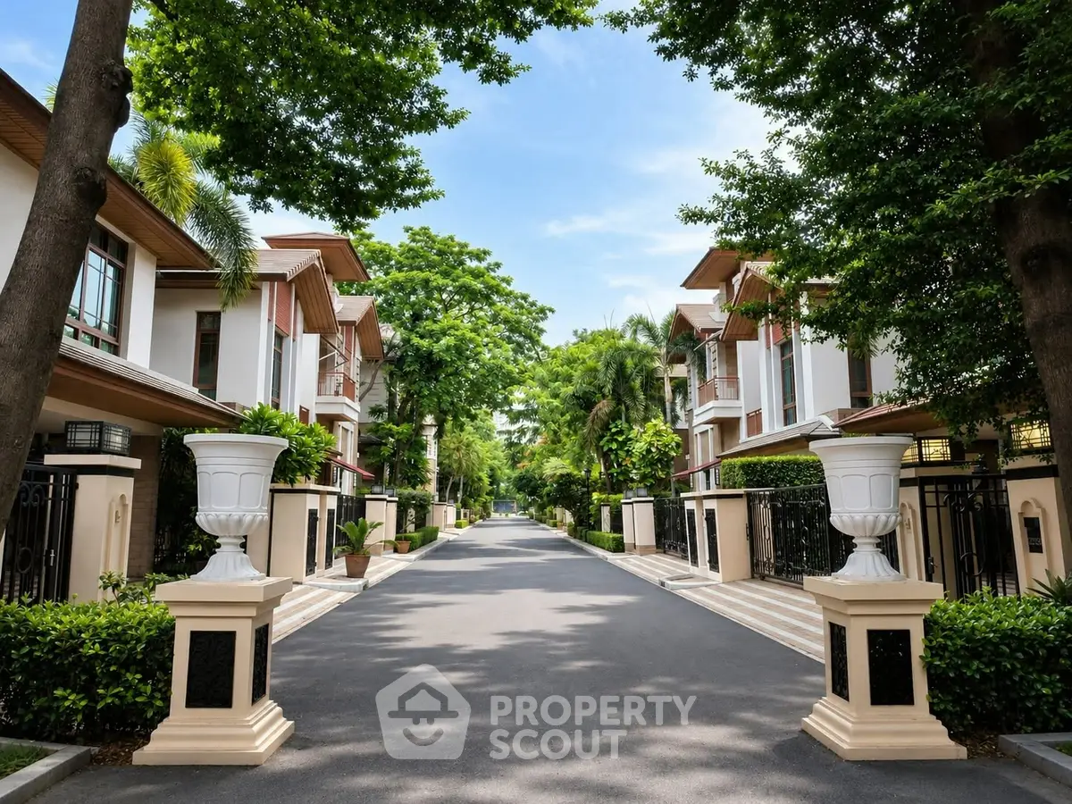 Luxurious residential street with elegant houses and lush greenery, perfect for upscale living.