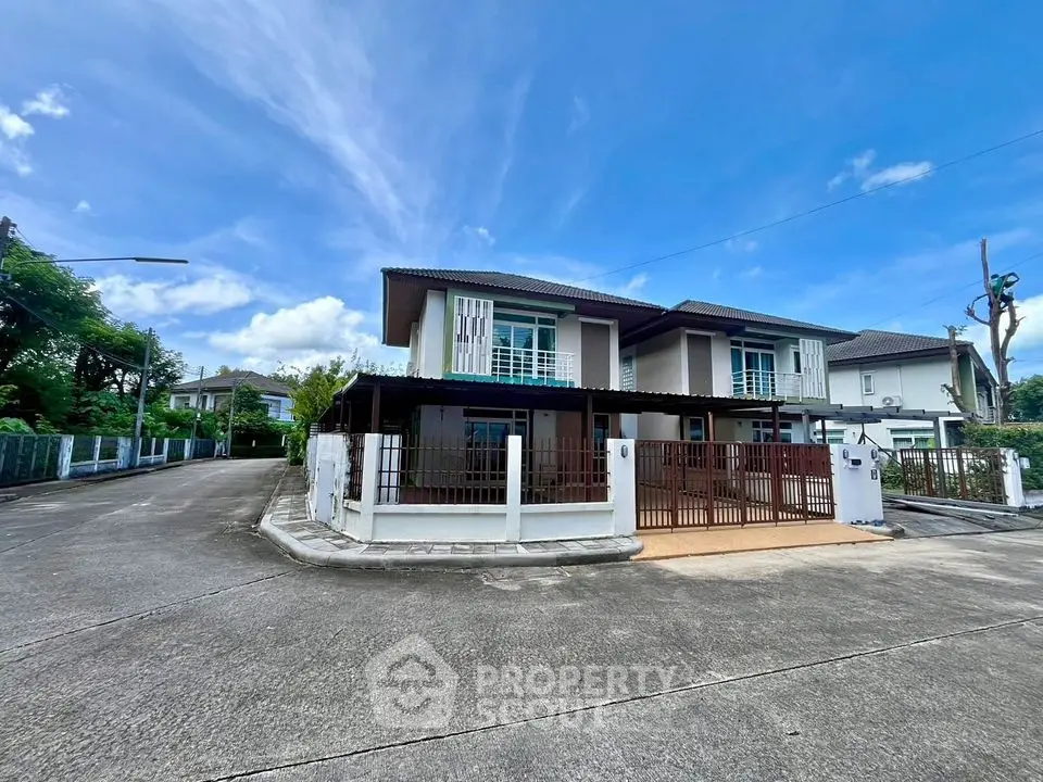 Spacious corner unit house with modern design and large driveway in a serene neighborhood.