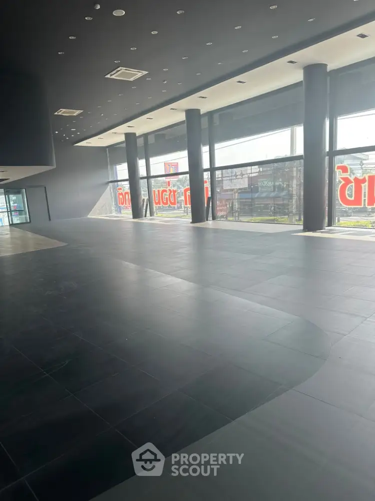 Spacious commercial property with large windows and modern design