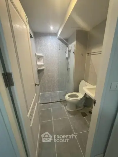 Modern bathroom with sleek design and spacious shower area