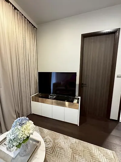 Modern living room with sleek TV stand and elegant decor