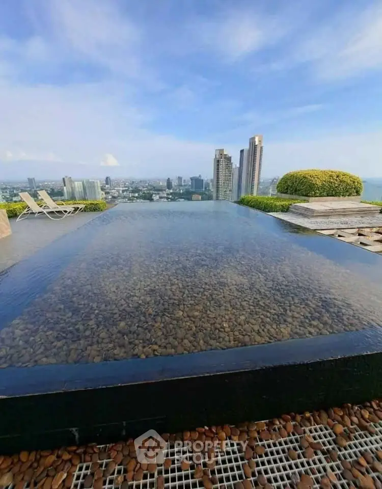 Luxurious rooftop infinity pool with stunning city skyline view