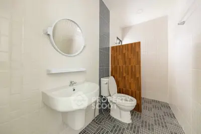 Modern bathroom with sleek design and stylish tile accents