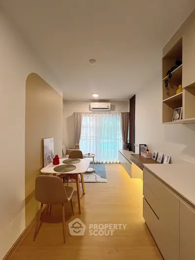 Modern living room with stylish dining area and natural light