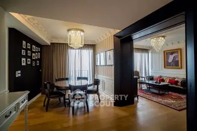 Luxurious living room with elegant dining area and stunning chandeliers