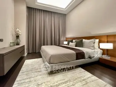 Luxurious modern bedroom with elegant decor and ambient lighting
