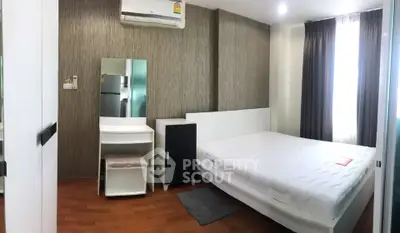 Modern bedroom with minimalist design and ample natural light