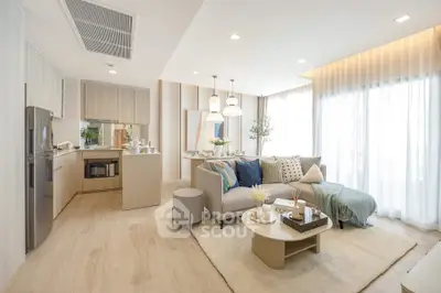 Modern open-plan living room with stylish decor and natural light