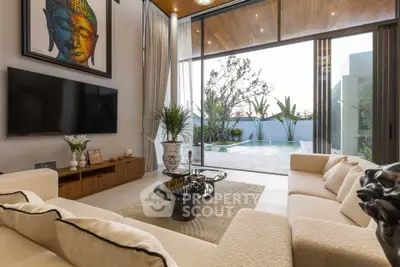 Luxurious living room with pool view, modern decor, and floor-to-ceiling windows.