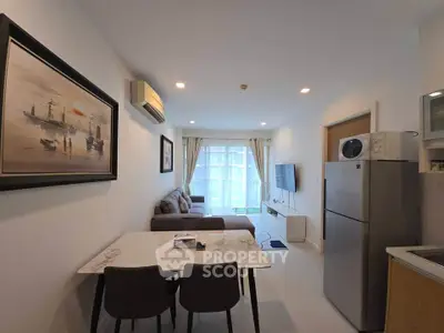 Modern living room with dining area and kitchen in open layout apartment