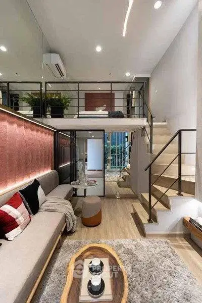 Modern loft apartment with stylish living room and mezzanine bedroom
