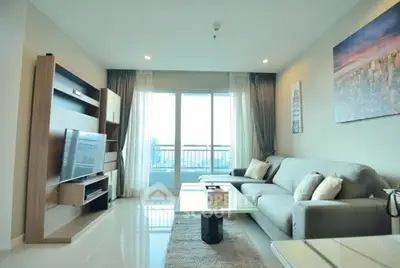 Spacious modern living room with large windows and stylish decor