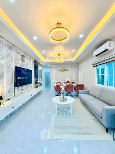 Luxurious modern living room with elegant lighting and stylish decor