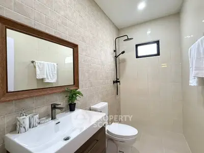 Modern bathroom with sleek fixtures and elegant tile design