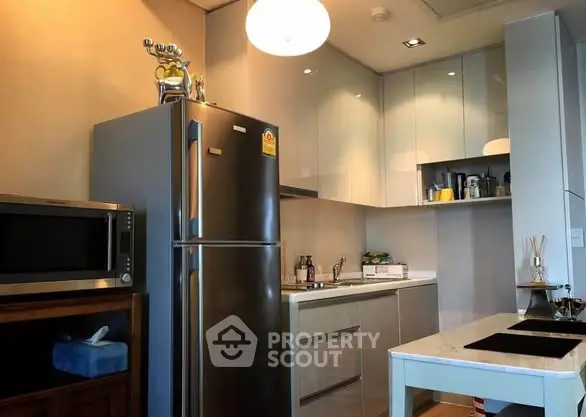 Modern kitchen with sleek appliances and stylish cabinetry