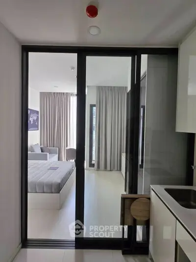 Modern studio apartment with sleek design and natural light