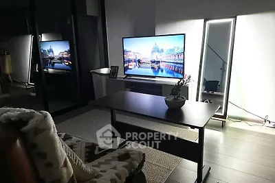Modern living room with sleek TV setup and stylish decor