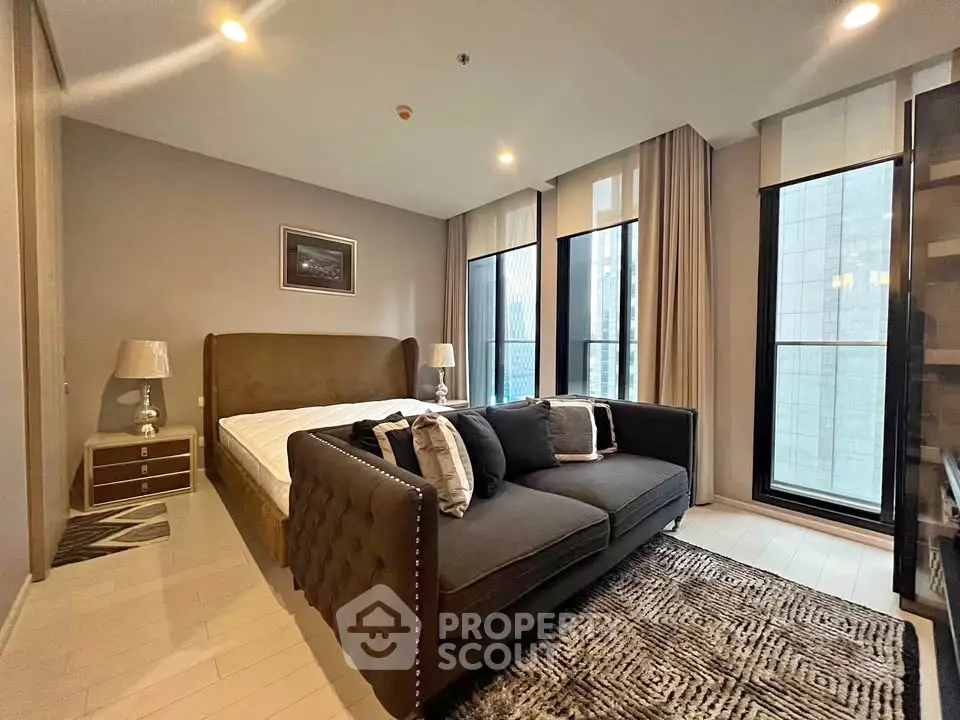 Luxurious bedroom with elegant decor and city view