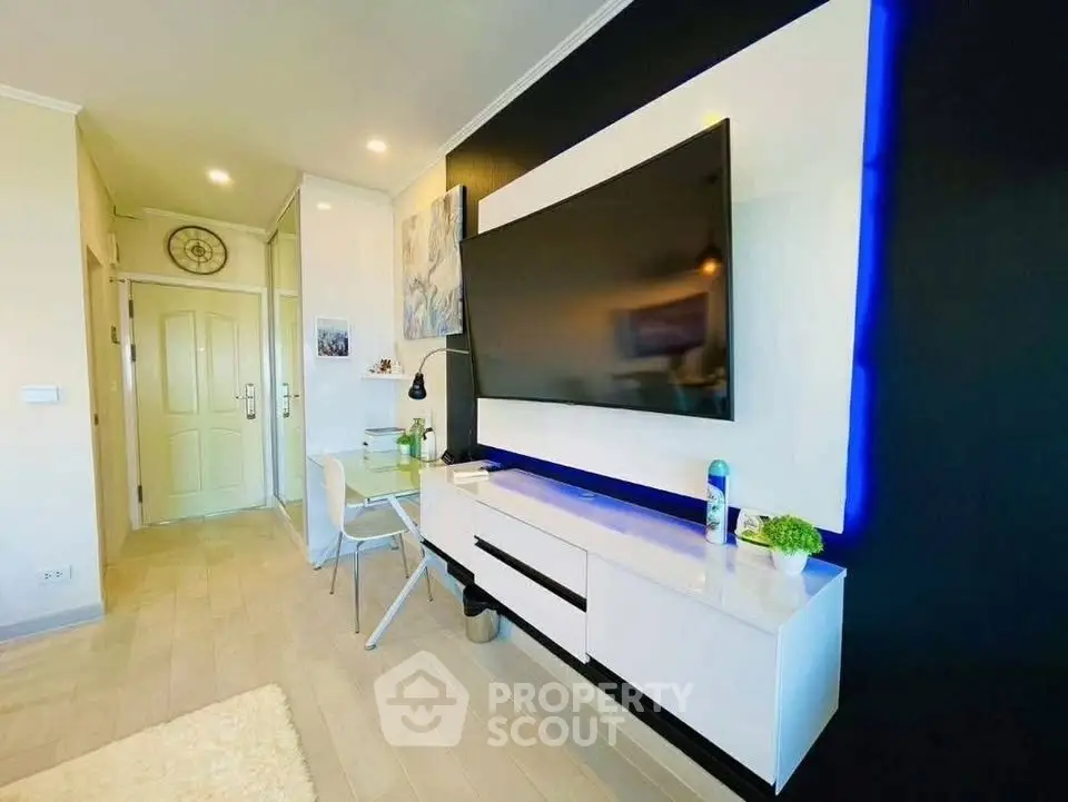 Modern living room with sleek TV setup and stylish decor