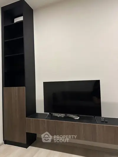 Modern living room with sleek TV unit and minimalist design
