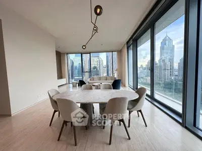 Luxurious modern dining area with stunning city skyline view, featuring elegant furniture and floor-to-ceiling windows.