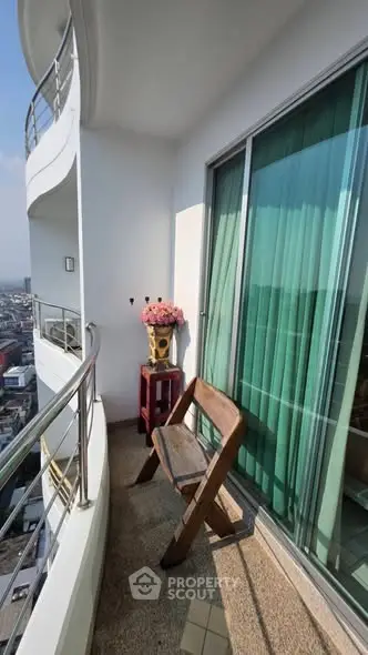 Charming balcony with city view, perfect for relaxation and enjoying the skyline.