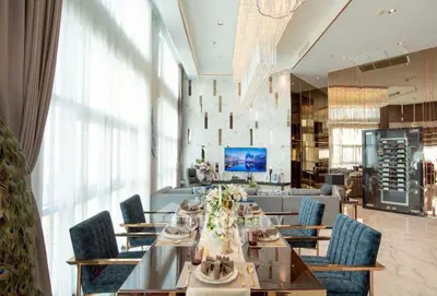 Luxurious living room with elegant dining setup and modern decor