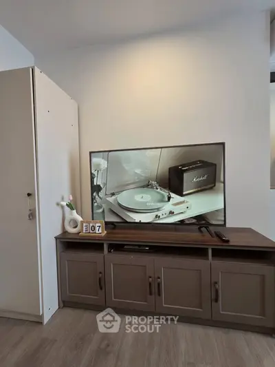 Modern living room with stylish TV stand and sleek decor