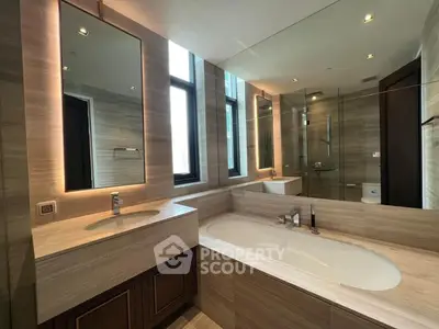 Luxurious modern bathroom with elegant bathtub and stylish lighting