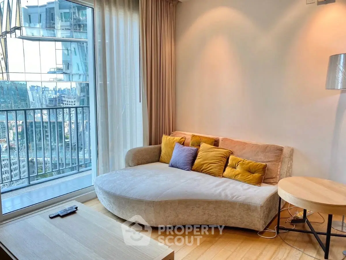 Modern living room with stylish sofa and city view from large window