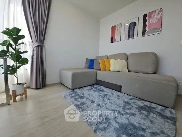 Modern living room with cozy sectional sofa and stylish decor